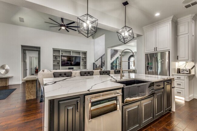 Building Photo - A must see in highly sought after Windsong...