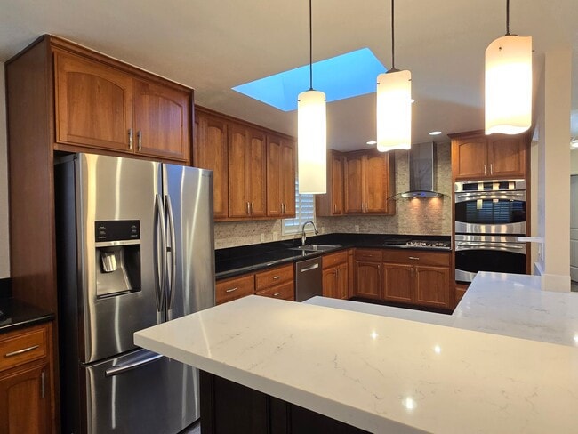 Building Photo - Large Campbell Home, Remodeled Inside, Gorgeous Kitchen, Large Master Suite, A/C, Beautiful Yards!