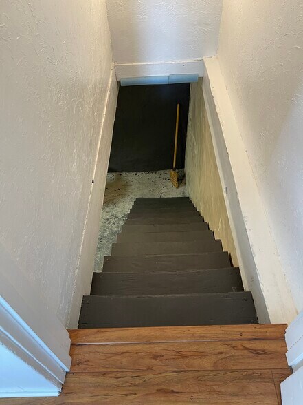 stairs to basement laundry/storage - 640 S 4th Ave