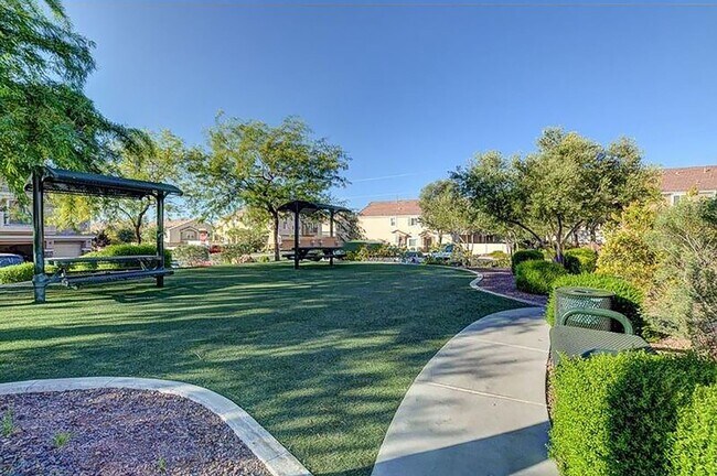 Building Photo - Great townhome in Henderson Gated Community with a 2 car attached garage and backyard