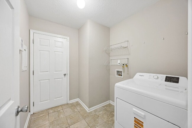 Building Photo - Elegant 4BR Home with Gourmet Kitchen, Smart Tech Package & Nature Views - Coming Soon