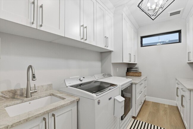 Building Photo - Modern 5-Bed Home in Atlas Waterfront — Elevator, Luxury Finishes & Prime Location