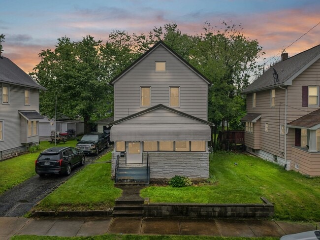 Primary Photo - Charming 3BR with Main-Level Suite, Garage...