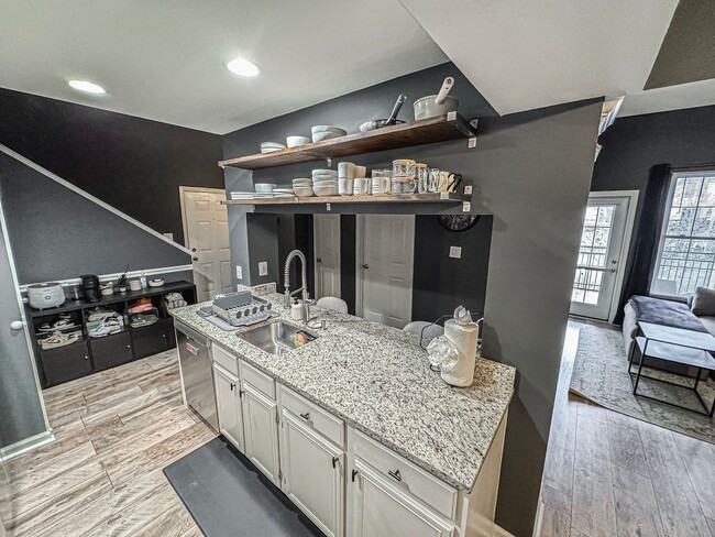 Building Photo - Stylish 3 Bed 3 Bath Condo With Large Balcony in Desired Riverbend at Cascades - Water Included