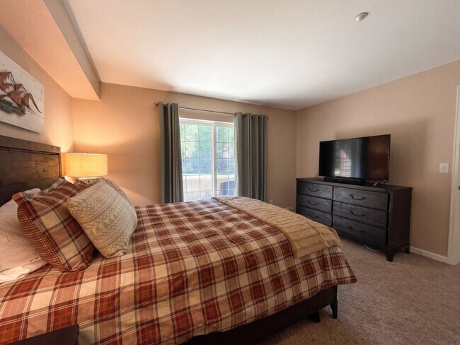 Building Photo - Two-Bedroom Condo with Attached Garage, Available Now