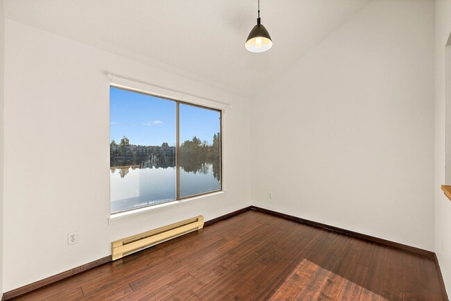 Building Photo - Top-Floor Condo with Panoramic Lake Easter Views, Vaulted Ceilings & Modern Updates!