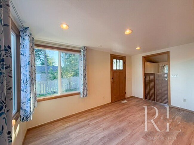 Building Photo - Waterfront Bliss: Stunning Puget Sound Views & Your Own Private Beach!