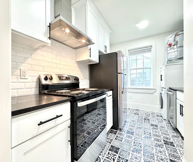 Building Photo - The Gladiola – Newly Renovated Luxury Living Near LSU Lakes