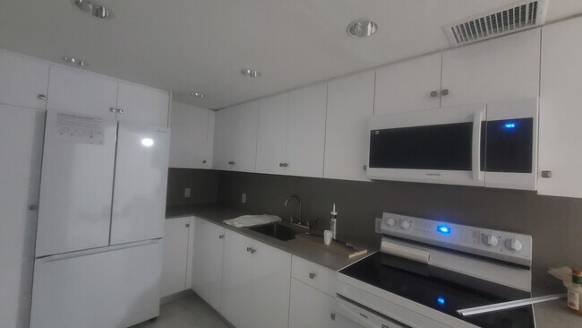 Fully renovated kitchen. - 1251 NE 108th St