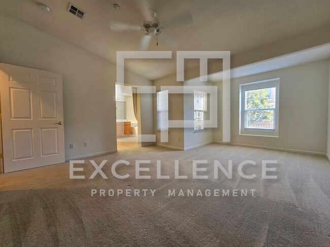Building Photo - Spacious 3/2.5 Located In Communication Hills, With Two 1 Car Garages, W/D & Large Master Retreat