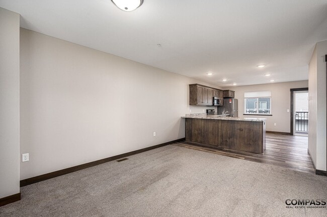 Building Photo - SPACIOUS AND MODERN TOWNHOME