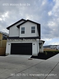 Building Photo - 6935 Woods Rose Dr