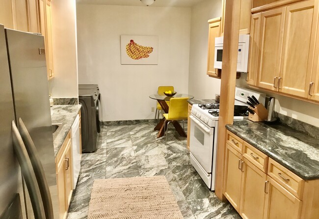 Updated eat-in kitchen - 8455 Fountain Ave