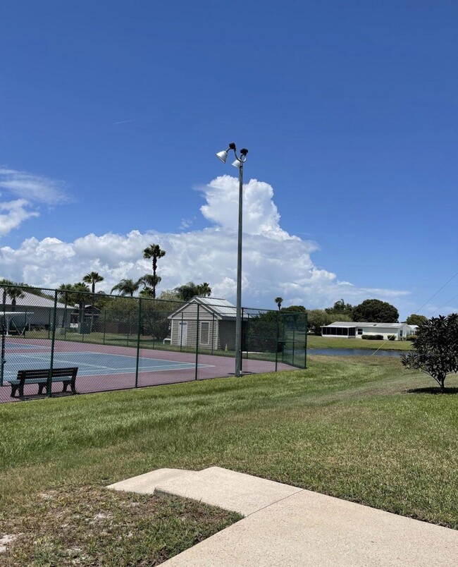 Building Photo - 8179 Sandwedge Terrace