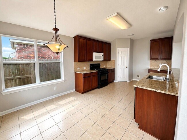 Building Photo - Hollyhock Drive, Stafford, TX 77477 - 4 BR 2 BA single-family home