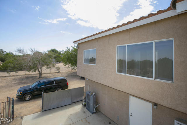 Building Photo - 3831 E Ave T 8