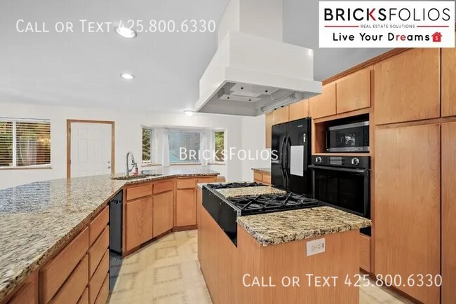 Building Photo - Welcome to Tukwila Haven – Open Concept Home Near Sound Transit!