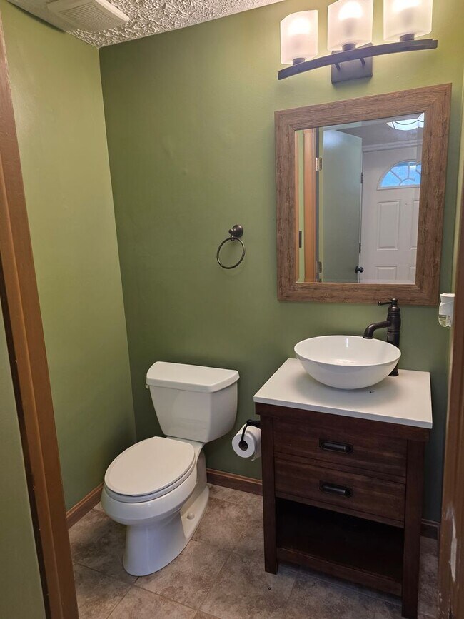 Building Photo - Serene Living in a Quiet Lakeside Community