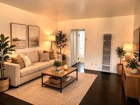Building Photo - 6128 De Longpre Ave