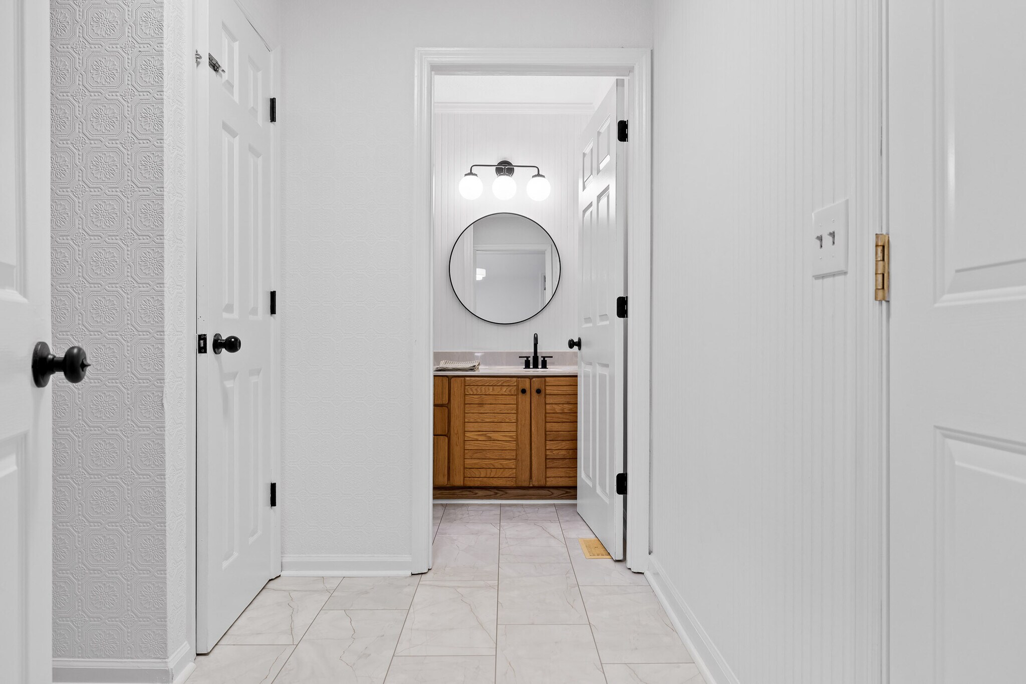 Powder Room & Laundry Hallway - 224 N Brent Dr