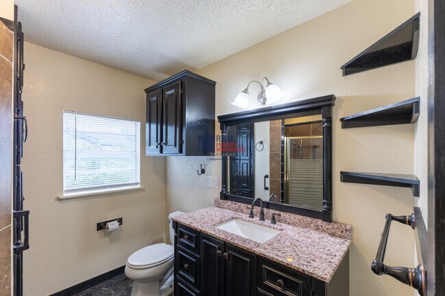 Building Photo - Distinctive Glen Rose Home with Large Rooms, Fenced Yard & Covered Parking