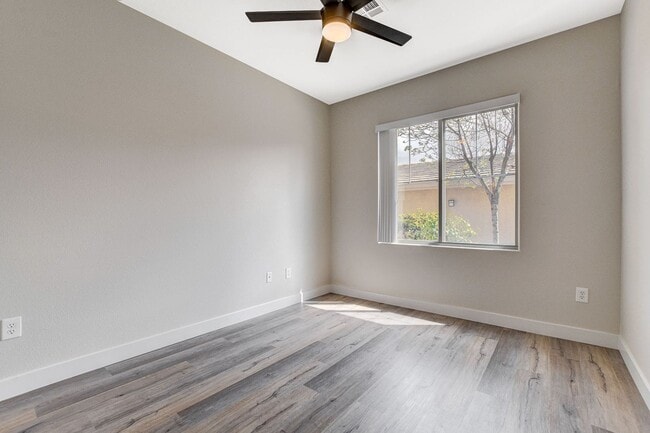 Building Photo - Upgraded First-Floor Condo in a Gated Summ...