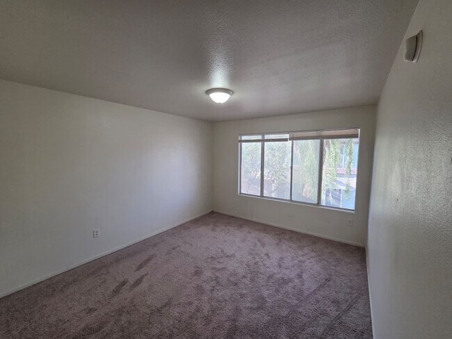Building Photo - Spacious 3-Bedroom, 2-Bath Condo with Priv...