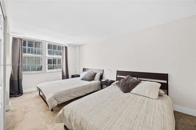 Building Photo - 5555 Collins Ave