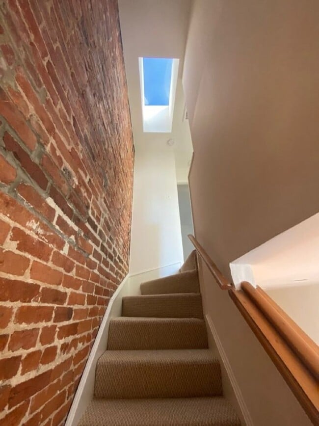 Building Photo - A charming two bedroom one and one half  bath row house located just off New Jersey Ave in the Sh...
