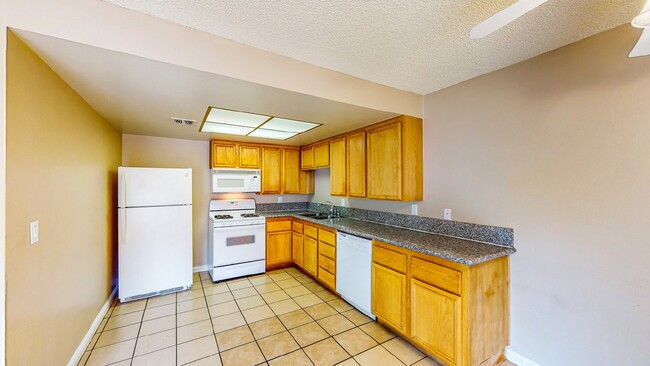 Building Photo - "Discover Modern Comfort: Spacious 2-Bed, ...