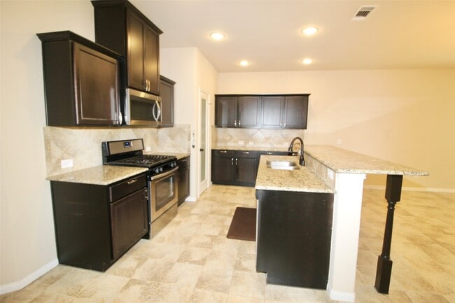 Building Photo - 1916 Acaciawood Way