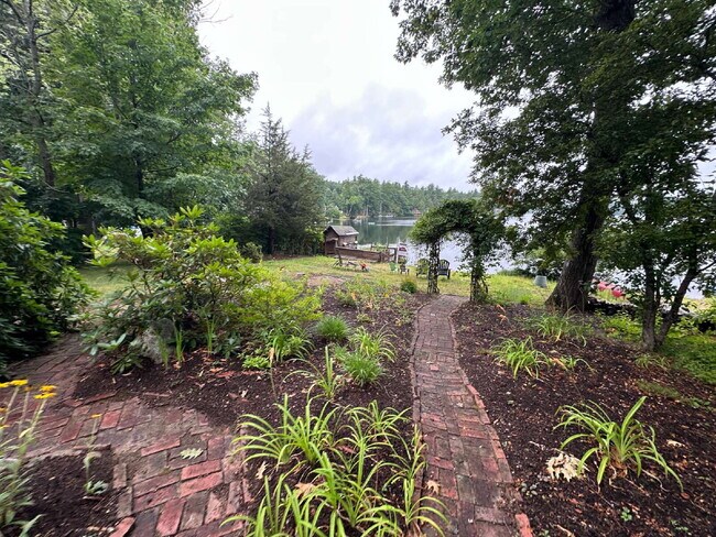 Building Photo - Peaceful Waterfront Living: 2-Story Home on River Road with Ample Outdoor Storage & Water Extras!