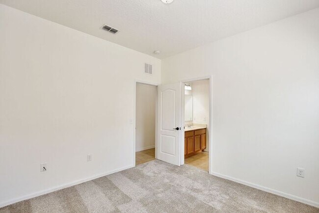 Building Photo - Water-View 4BR/3BA with 3-Car Garage in Gated North Shore - Near Lake Nona & Medical City