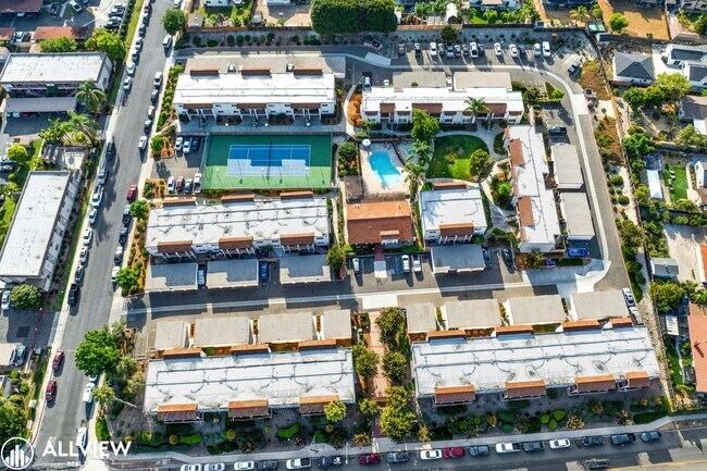 Building Photo - Modern 1-Bed Upstairs Condo with Garage & ...