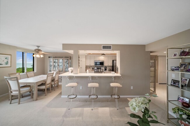 Building Photo - Vanderbilt Beach Condo! Ocean View ~ Avail...