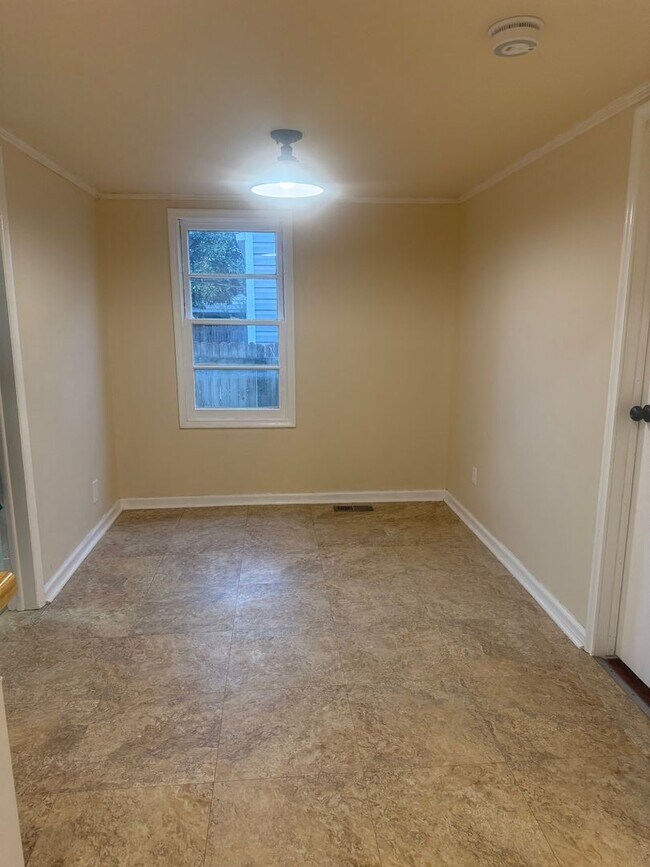 Building Photo - Step into this beautifully updated 1950's gem, where charm meets modern convenience