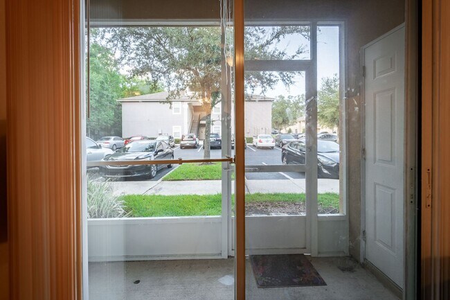 Building Photo - Spacious 2BR/2BA Condo – First Floor, Gate...