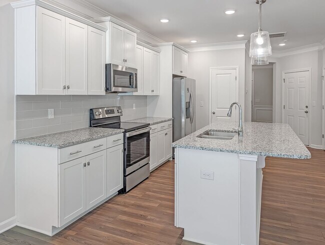 Building Photo - Spacious 3 Bed / 2.5 Bath Townhouse with Loft & 1-Car Garage