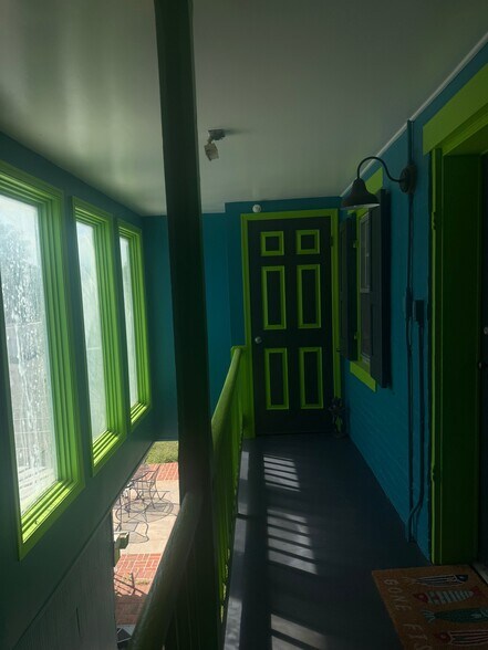 Private Balcony & peak of the shared brick patio - 344B W Patrick St