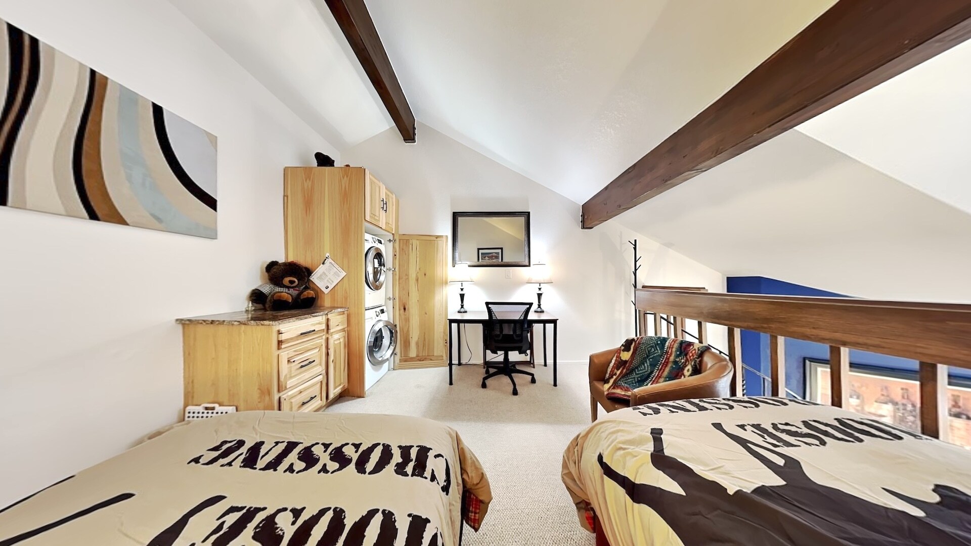 loft area with washer and dryer - 1530 Empire Ave