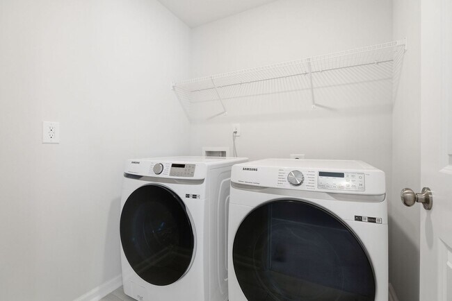 Building Photo - Upgraded 3BR Townhome in Wake Forest | Open Layout, Garage & Resort-Style Amenities