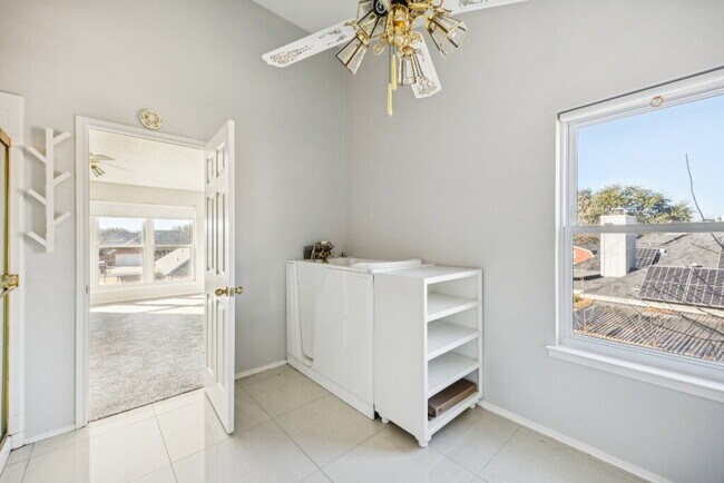 Building Photo - "Spacious 4-Bedroom, 2.5-Bath Living Meets Storybook Backyard Charm!"