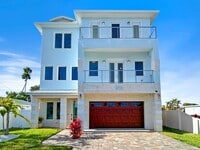 Building Photo - Waterfront Johns Pass Luxury | Steps to Beach + Pool, Hot Tub & Dock
