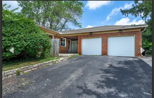 Building Photo - Quaint Duplex w/your Own Basement, Garage Space & Patio