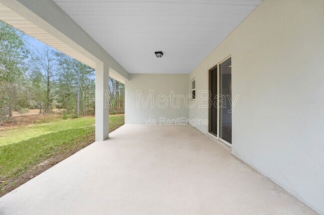 Building Photo - 9461 N Sandree Dr