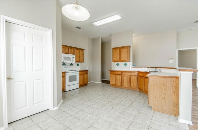 Building Photo - 4849 Carrotwood Dr