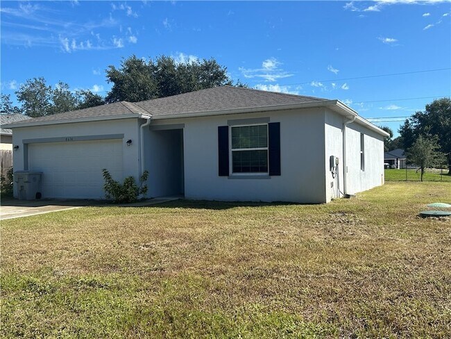 Building Photo - 8616 100th Ct