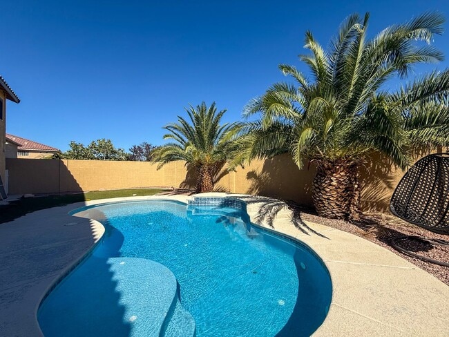 Building Photo - SPACIOUS HOME IN GATED COMMUNITY WITH POOL, RV PARKING & 4-CAR GARAGE!