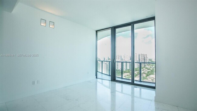 Building Photo - 19575 Collins Ave