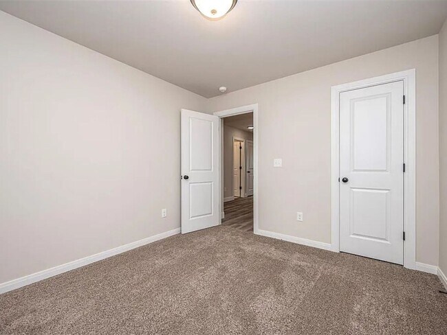 Building Photo - 4-Bed Home with Storm Shelter & 2-Car Garage in Mustang